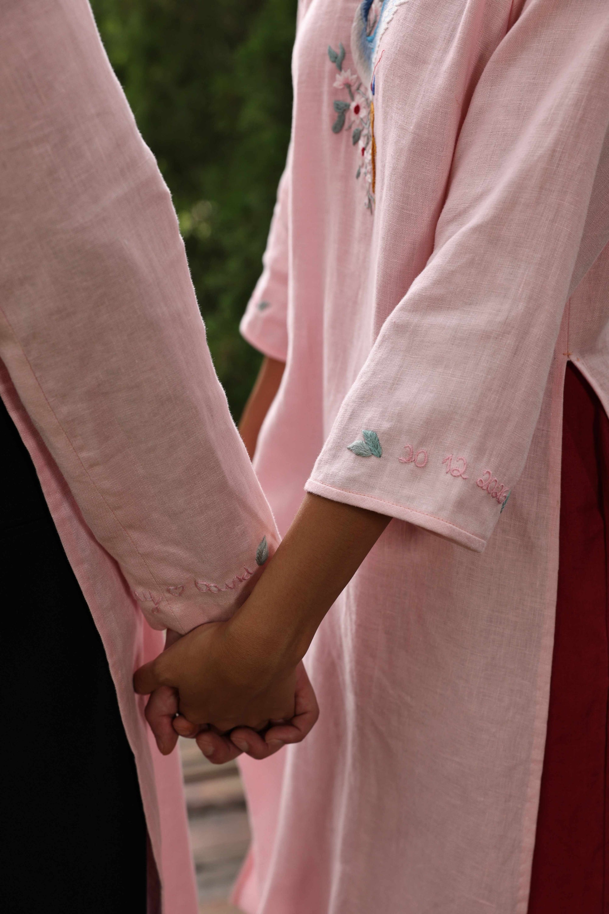 Hand-embroidered ao dai couple set