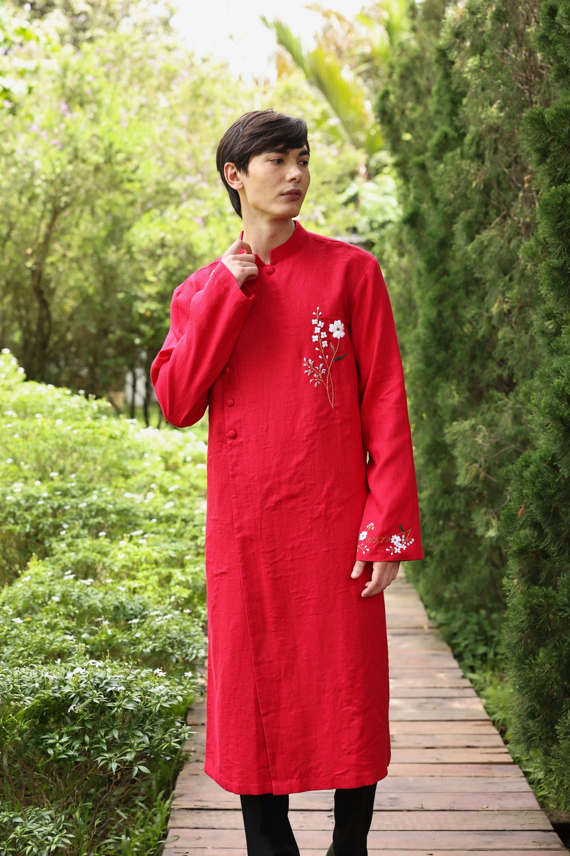 Hand-embroidered men’s wedding ao dai