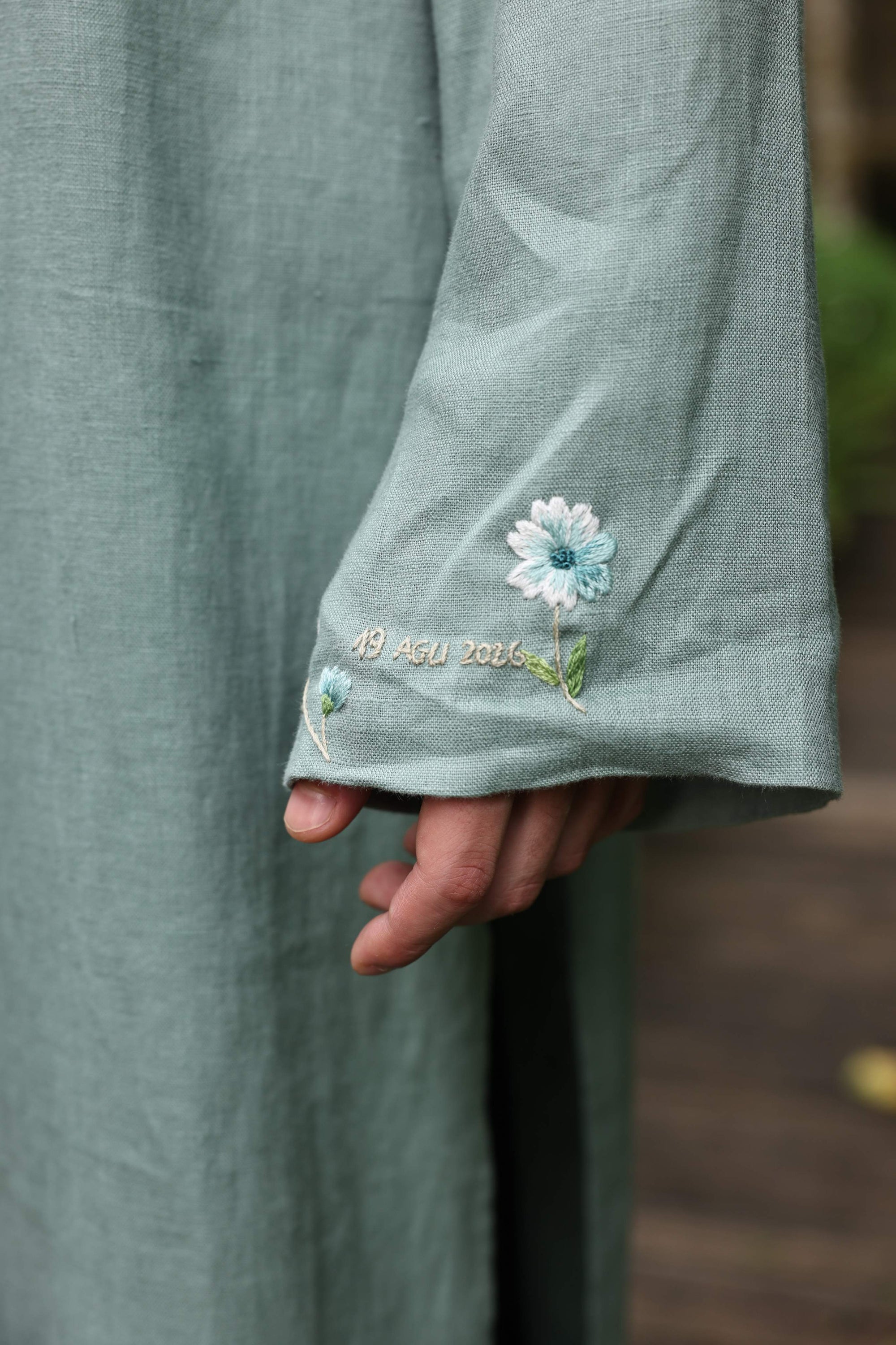 Hand-embroidered linen ao dai couple set