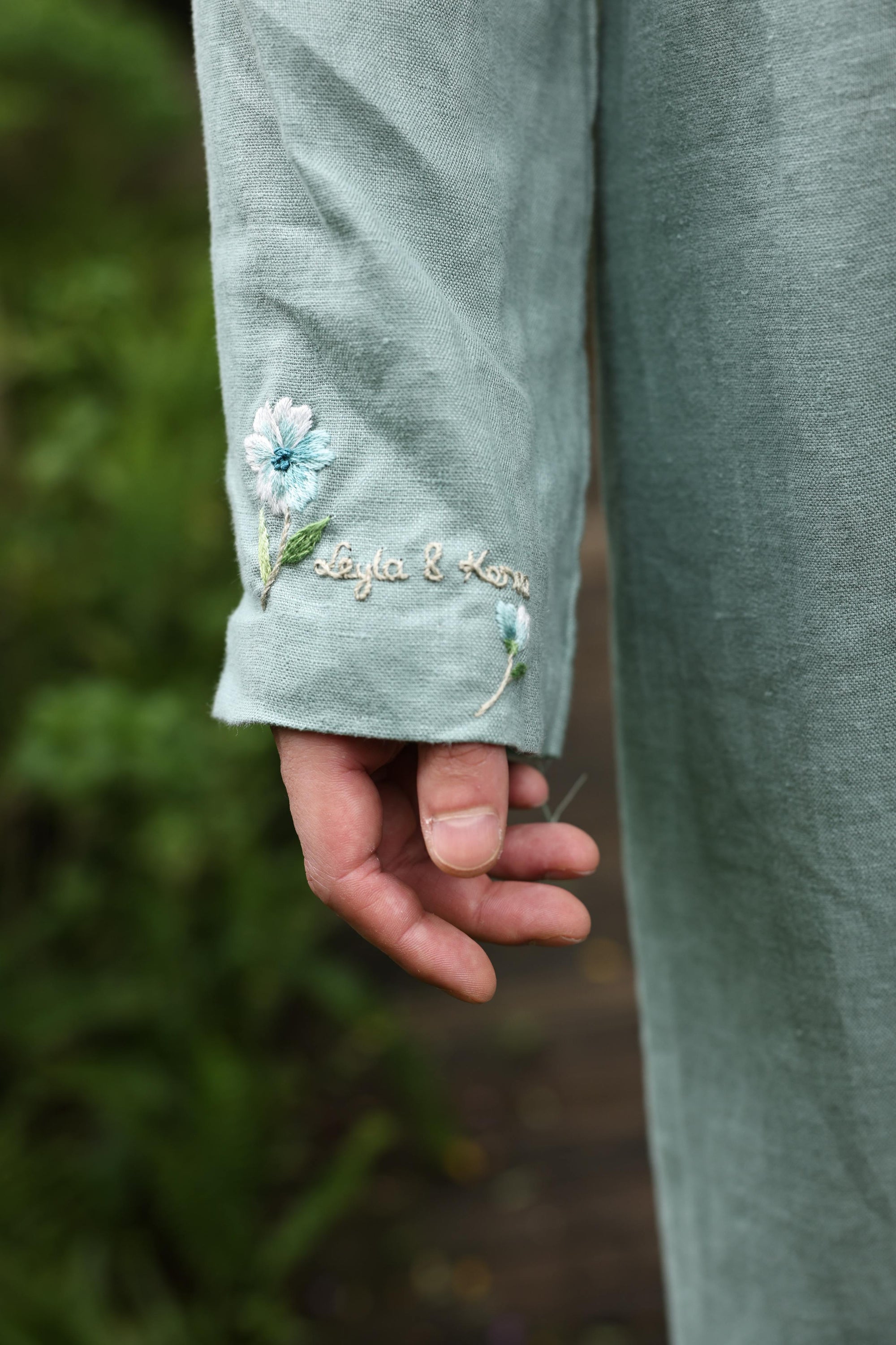 Hand-embroidered linen ao dai couple set