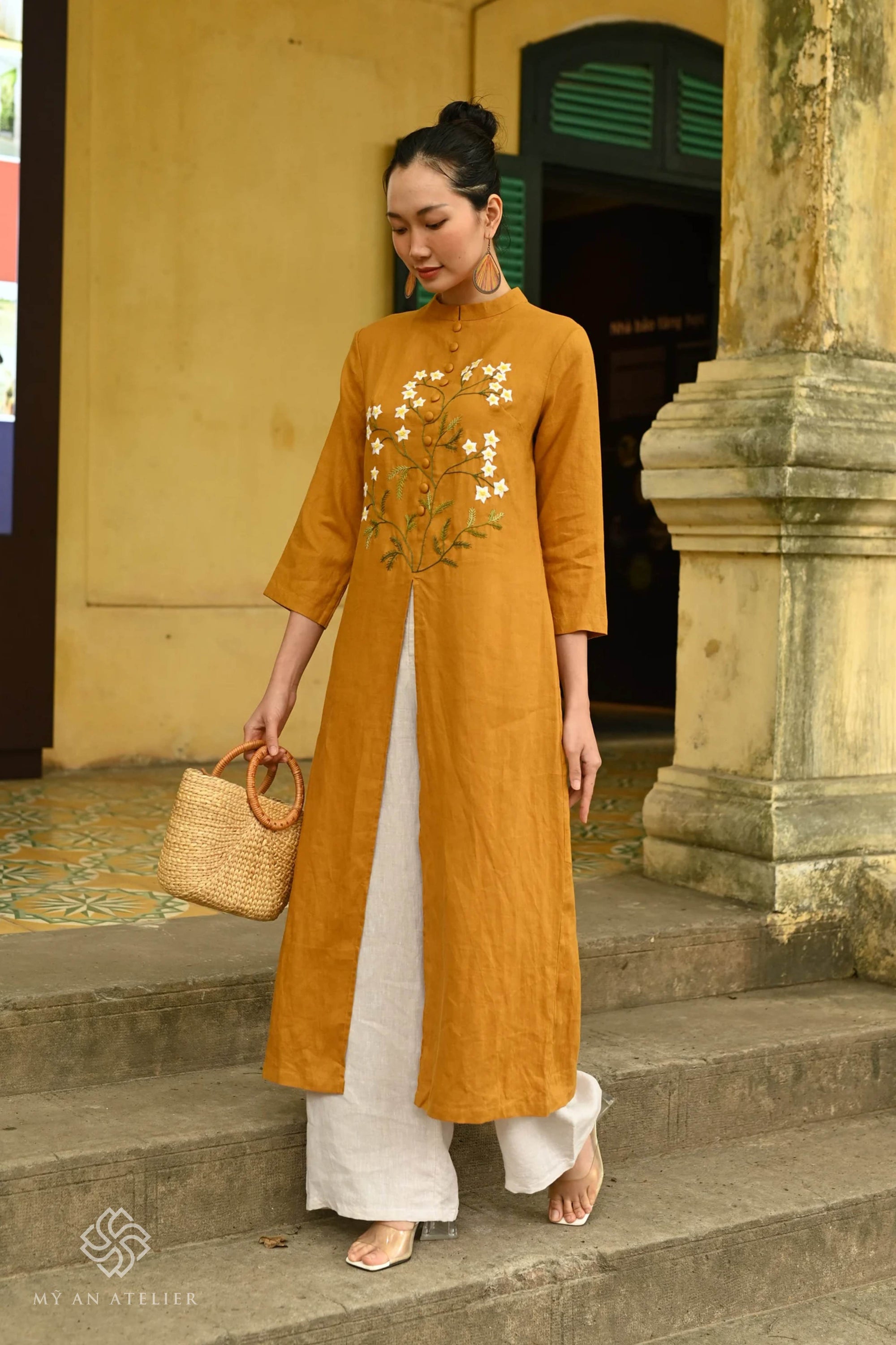 Hand-embroidered linen ao dai for Tet