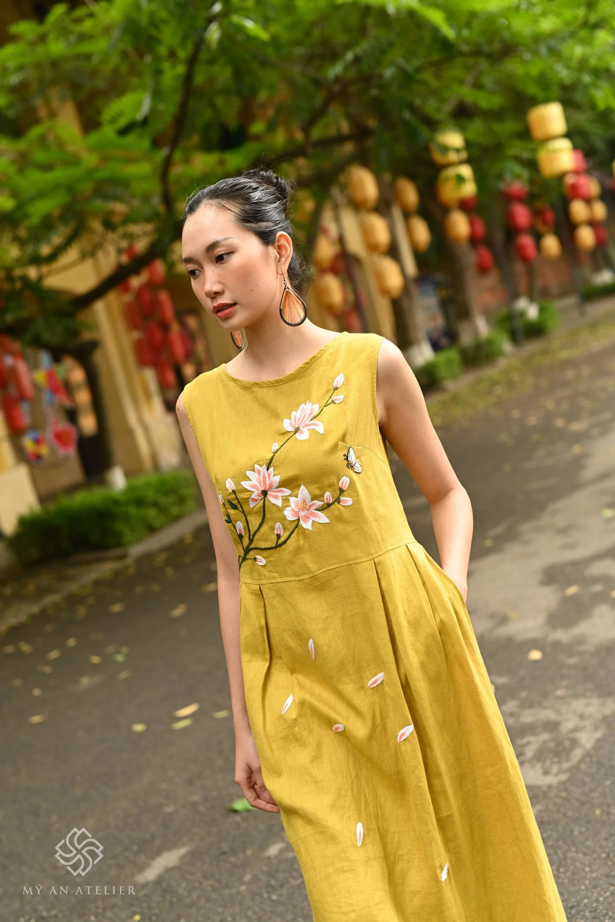 Hand-embroidered linen sleeveless ao dai