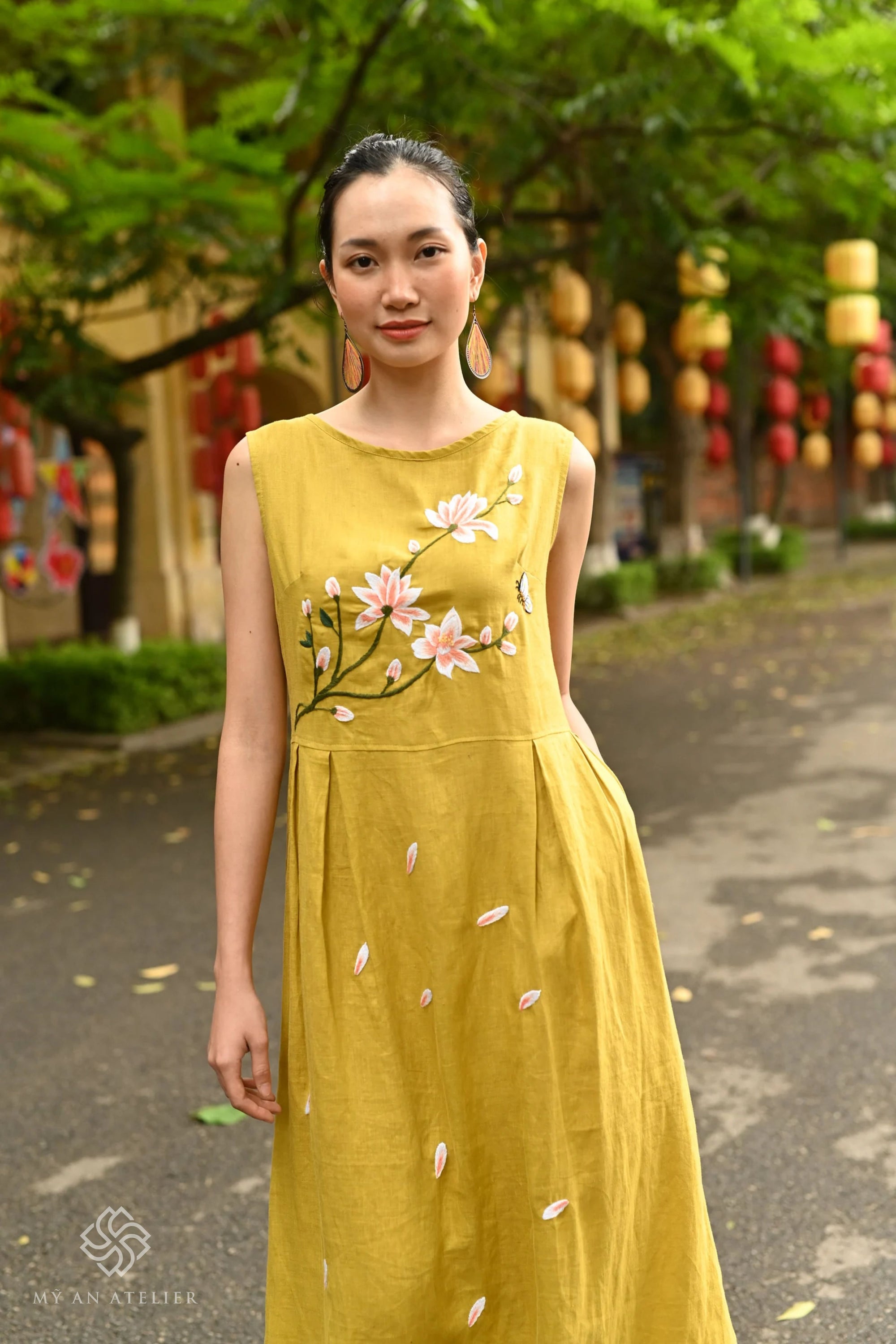 Hand-embroidered linen sleeveless ao dai