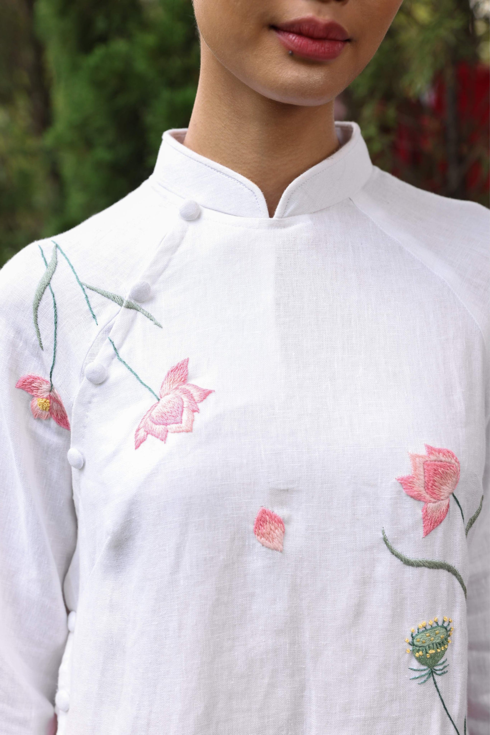 Hand-embroidered white linen ao dai