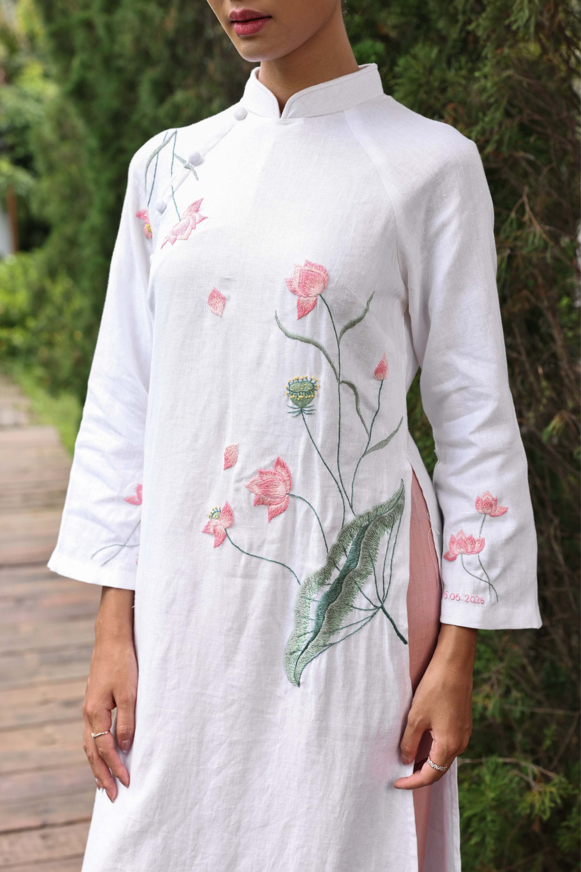 Hand-embroidered white linen ao dai