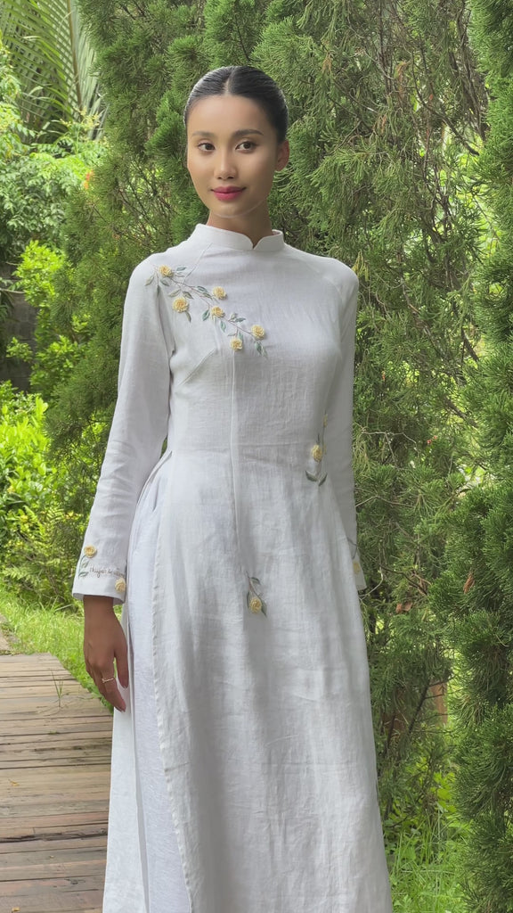 White hand-embroidered linen ao dai